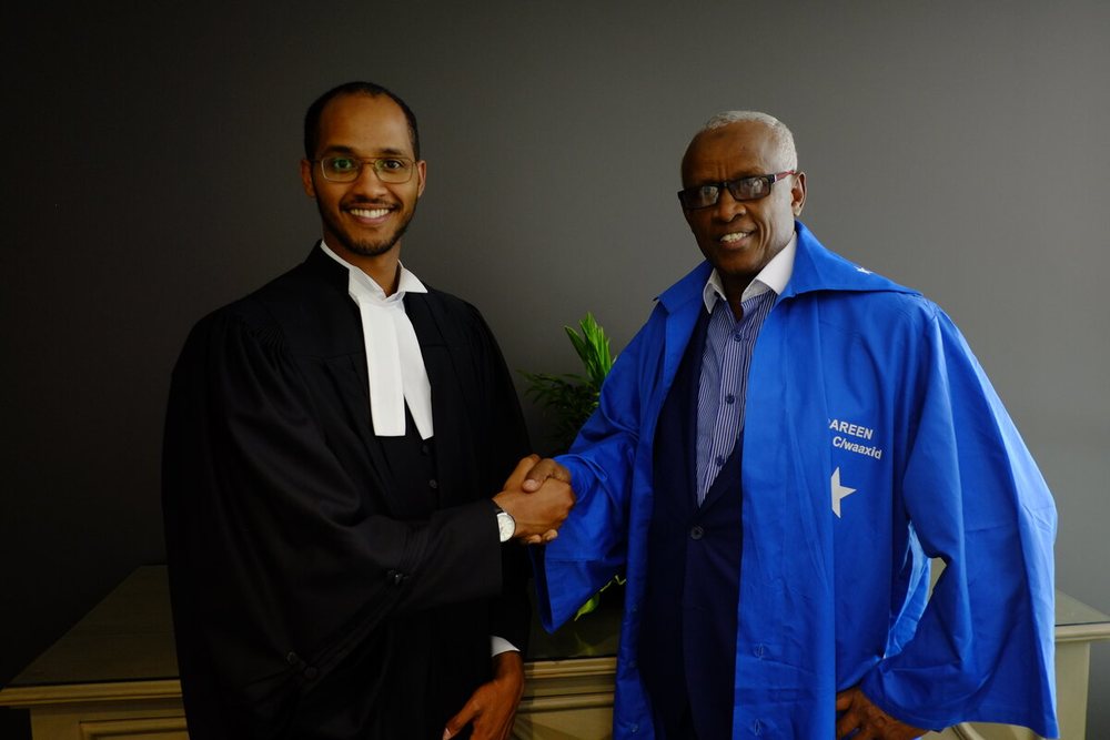 With his son a family legal tradition