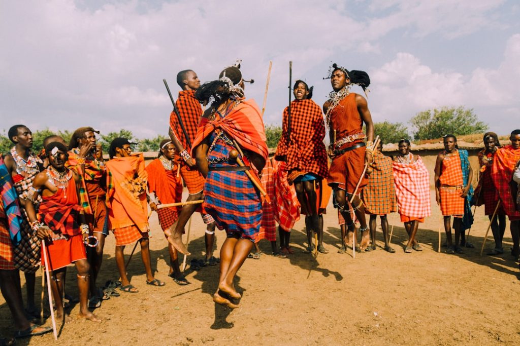 a group of people standing around each other